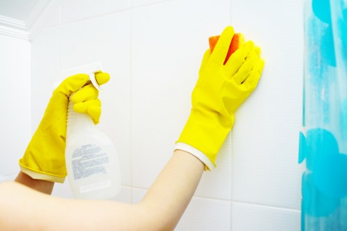 Discussing a cleaning complaint with staff in a professional meeting